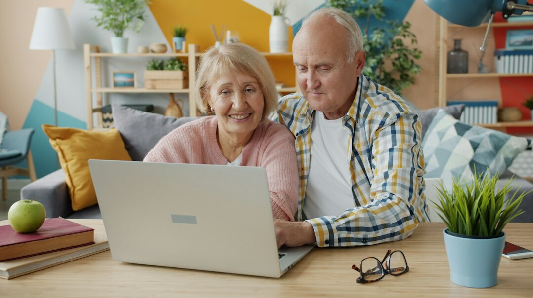 elderly couple discussing finances